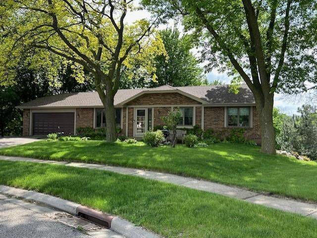14433 Guthrie Way, Apple Valley, MN 55124 - single story home featuring a garage, a front lawn, brick siding, and driveway