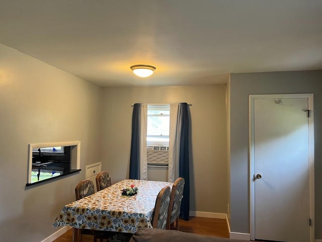 312 1st St NE, Sebeka, MN 56477 - dining area featuring baseboards and wood finished floors