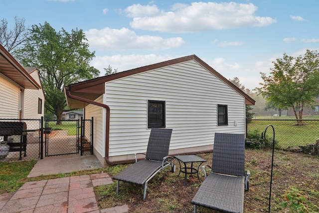 5963 Viking Blvd, Wyoming, MN 55092 - rear view of house with a gate