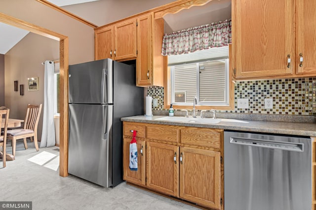 914 106th Ave NW, Coon Rapids, MN 55433 - kitchen featuring appliances with stainless steel finishes and backsplash