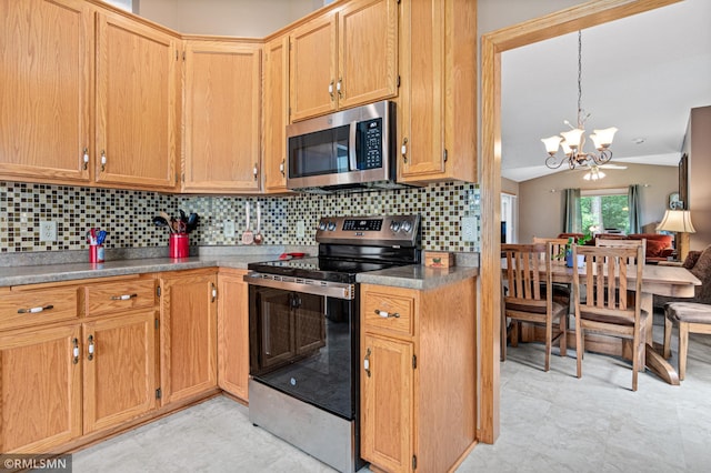 914 106th Ave NW, Coon Rapids, MN 55433 - kitchen featuring appliances with stainless steel finishes, a chandelier, lofted ceiling, decorative backsplash, and light floors