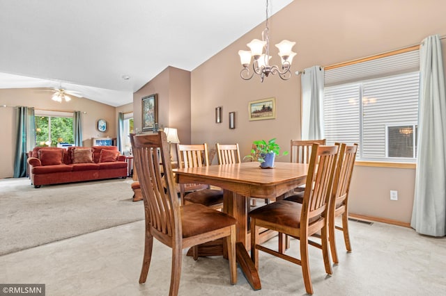 914 106th Ave NW, Coon Rapids, MN 55433 - dining room featuring lofted ceiling, a chandelier, a ceiling fan, and light colored carpet