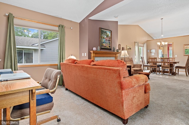 914 106th Ave NW, Coon Rapids, MN 55433 - living area with carpet flooring, lofted ceiling, and a chandelier