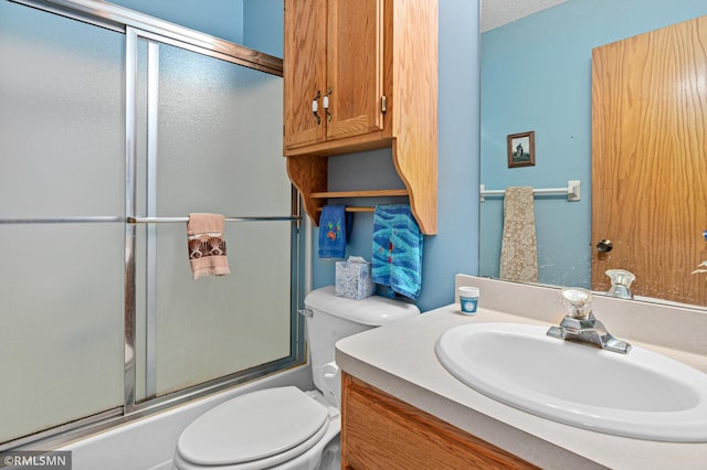 914 106th Ave NW, Coon Rapids, MN 55433 - full bathroom with vanity and bath / shower combo with glass door