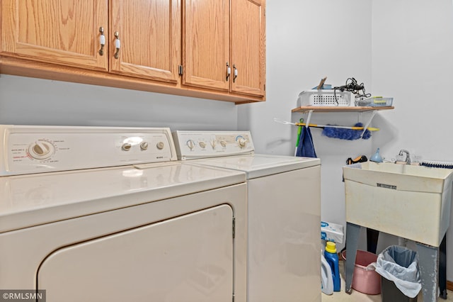 914 106th Ave NW, Coon Rapids, MN 55433 - laundry area featuring washing machine and dryer and cabinet space
