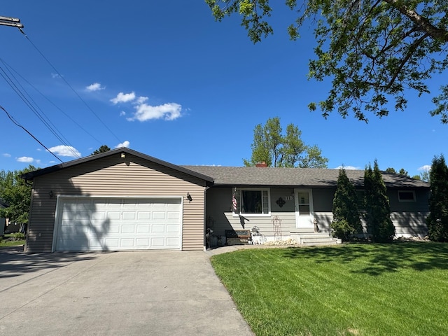 115 7th Ave S, Crookston, MN 56716 - ranch-style home featuring concrete driveway, a front lawn, and an attached garage