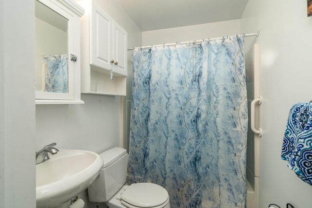 115 7th Ave S, Crookston, MN 56716 - bathroom featuring a sink and shower / bath combination with curtain