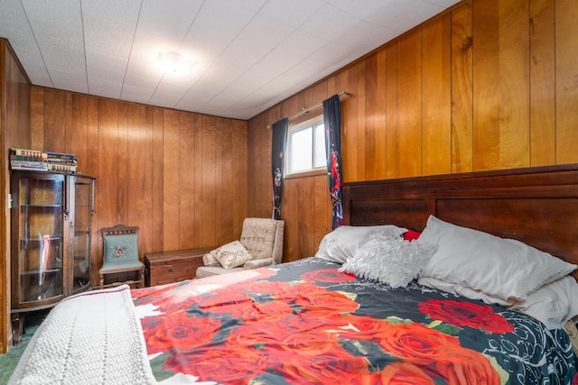115 7th Ave S, Crookston, MN 56716 - carpeted bedroom with wooden walls