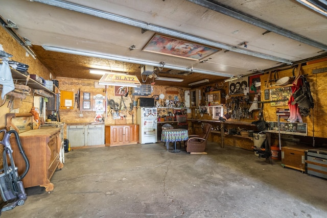 115 7th Ave S, Crookston, MN 56716 - garage featuring a workshop area