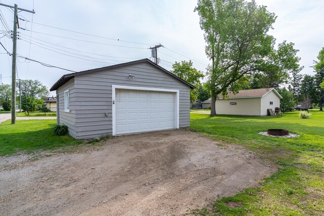 115 7th Ave S, Crookston, MN 56716 - detached garage with dirt driveway