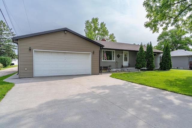115 7th Ave S, Crookston, MN 56716 - ranch-style house featuring a front lawn, an attached garage, driveway, and a chimney