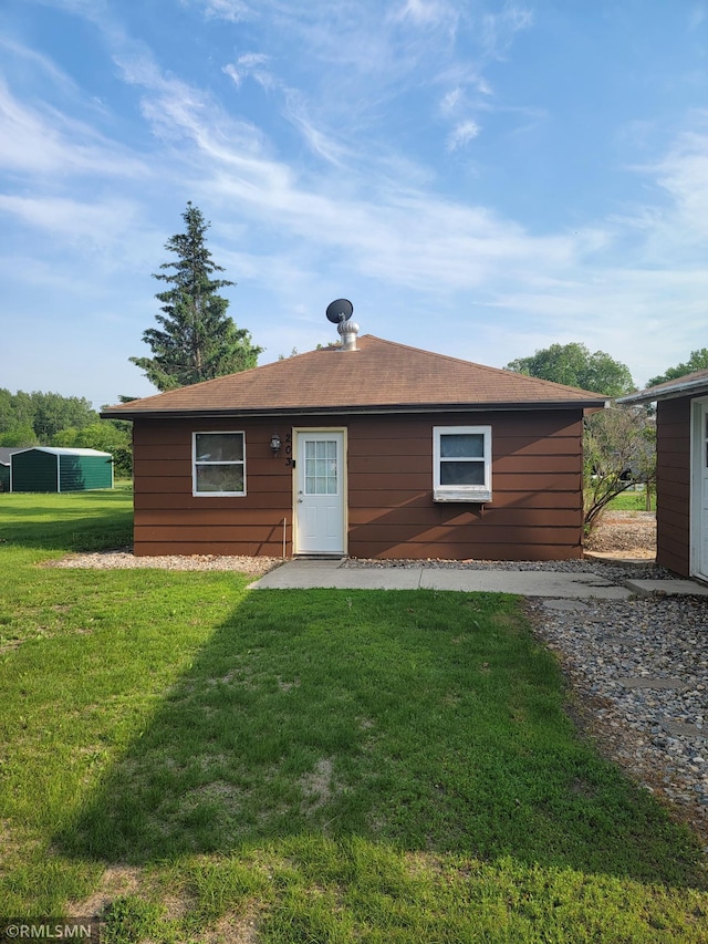 203 Ann Ave E, Clarissa, MN 56440 - view of front facade featuring a front lawn
