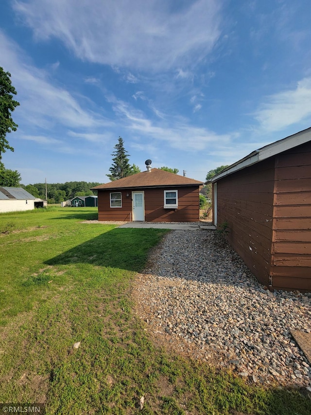 203 Ann Ave E, Clarissa, MN 56440 - back of property featuring a lawn