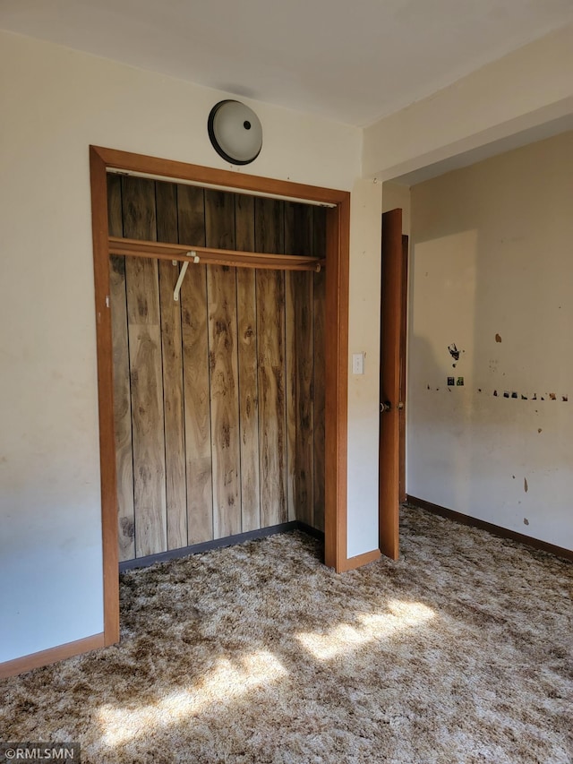 203 Ann Ave E, Clarissa, MN 56440 - unfurnished bedroom with carpet flooring, a closet, and baseboards