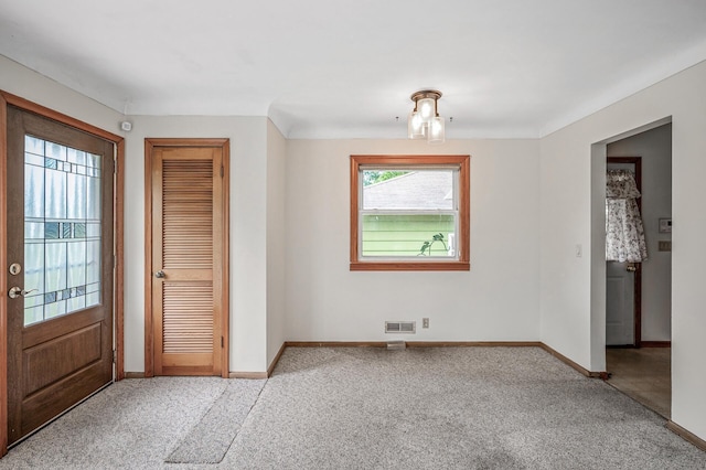 800 82nd Ave N, Brooklyn Park, MN 55444 - entryway featuring baseboards and carpet
