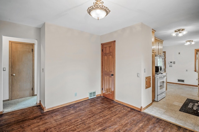 800 82nd Ave N, Brooklyn Park, MN 55444 - empty room featuring baseboards and light wood-style flooring