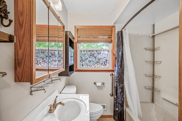 800 82nd Ave N, Brooklyn Park, MN 55444 - bathroom with shower / tub combo and vanity