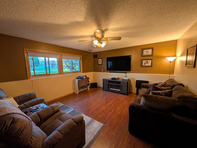 861 Lake Susan Dr, Chanhassen, MN 55317 - living area featuring wood finished floors, ceiling fan, and a textured ceiling