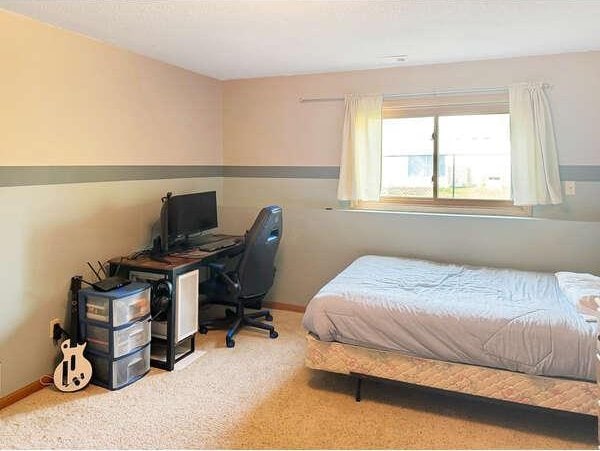 861 Lake Susan Dr, Chanhassen, MN 55317 - bedroom with carpet floors and an office area
