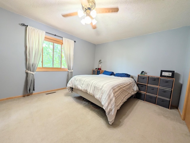 861 Lake Susan Dr, Chanhassen, MN 55317 - carpeted bedroom with a textured ceiling and a ceiling fan