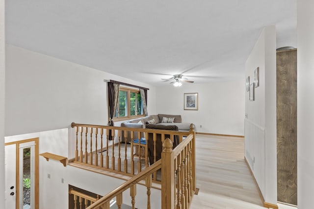 861 Lake Susan Dr, Chanhassen, MN 55317 - corridor featuring an upstairs landing and light wood finished floors