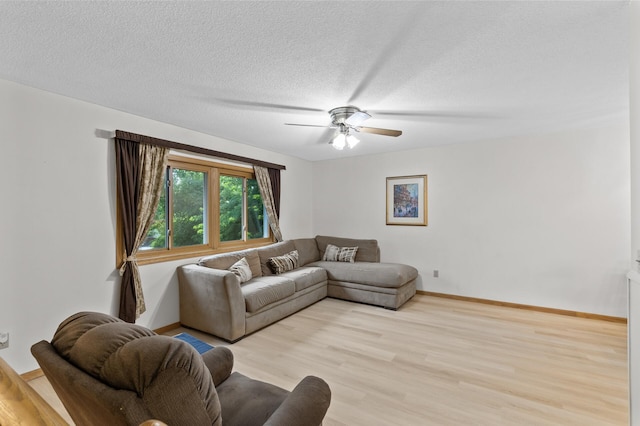 861 Lake Susan Dr, Chanhassen, MN 55317 - living room featuring light wood-style floors, ceiling fan, and a textured ceiling