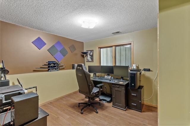 861 Lake Susan Dr, Chanhassen, MN 55317 - office area featuring light wood-type flooring and a textured ceiling