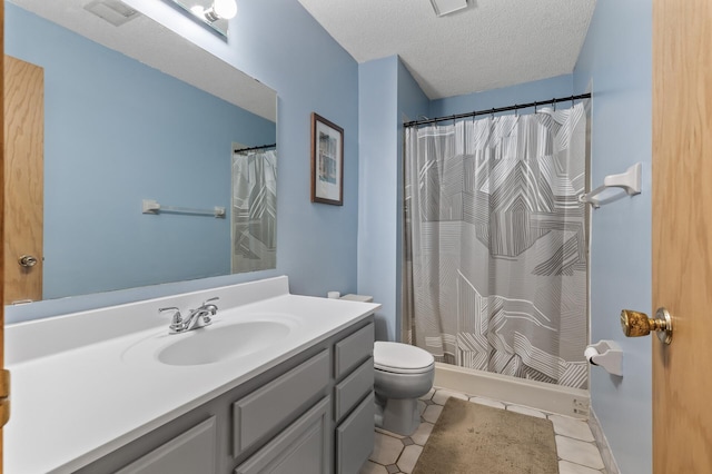 861 Lake Susan Dr, Chanhassen, MN 55317 - bathroom with vanity, a textured ceiling, a shower with curtain, and tile patterned floors
