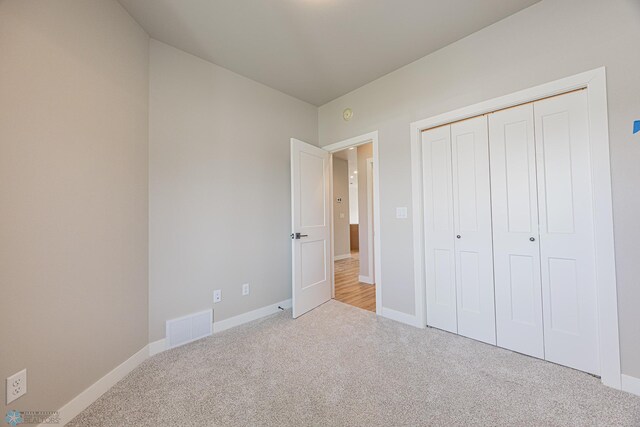 6614 68th St S, Horace, ND 58047 - unfurnished bedroom with carpet and a closet