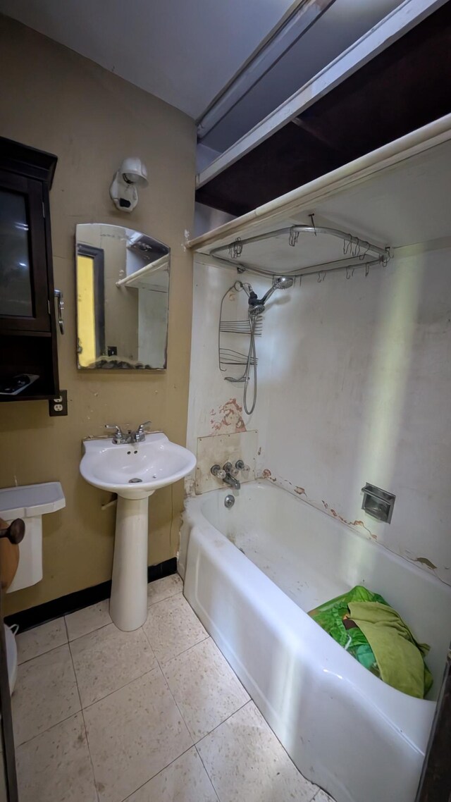 307 10th St S, Wheaton, MN 56296 - bathroom with baseboards and washtub / shower combination