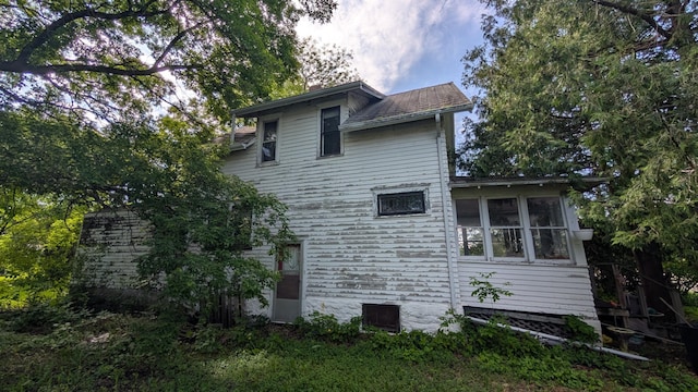 307 10th St S, Wheaton, MN 56296 - view of side of property with a sunroom