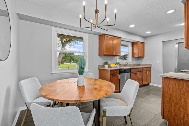 999 Elm Dr, Apple Valley, MN 55124 - dining room with a textured ceiling, a chandelier, plenty of natural light, and recessed lighting