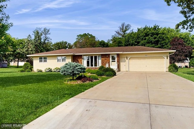 30339 72nd Avenue Way, Cannon Falls, MN 55009 - ranch-style home featuring an attached garage, driveway, and a front lawn