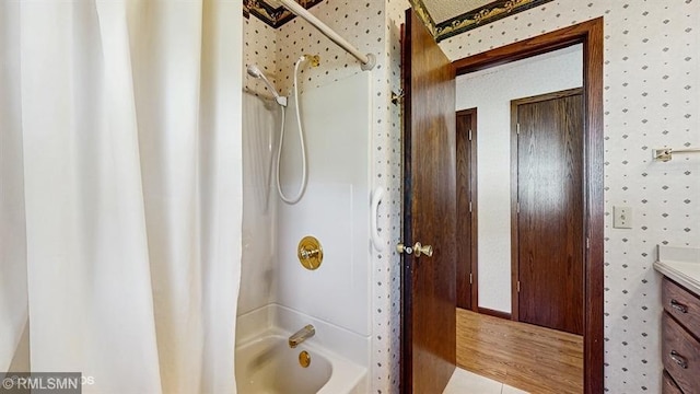 30339 72nd Avenue Way, Cannon Falls, MN 55009 - bathroom featuring shower / bath combination with curtain, vanity, and wallpapered walls