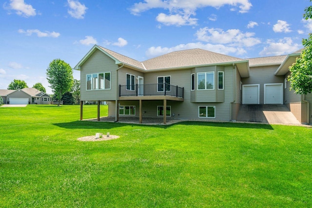 917 133rd Ln NE, Ham Lake, MN 55304 - rear view of property with a garage, a deck, and a yard