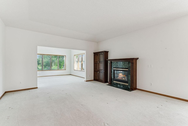 917 133rd Ln NE, Ham Lake, MN 55304 - unfurnished living room with light colored carpet and baseboards