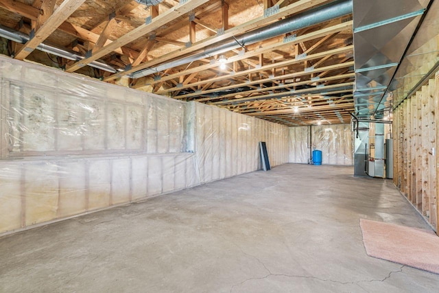 917 133rd Ln NE, Ham Lake, MN 55304 - unfinished basement featuring a water pressure tank and heating unit
