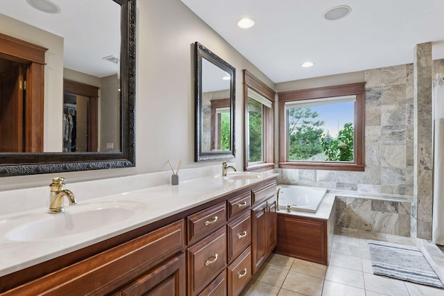 2906 Butternut Dr, Chaska, MN 55318 - bathroom with double vanity, a garden tub, tiled shower, tile patterned flooring, and recessed lighting