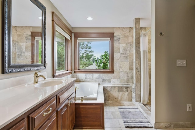 2906 Butternut Dr, Chaska, MN 55318 - full bathroom with vanity, a tile shower, and a garden tub