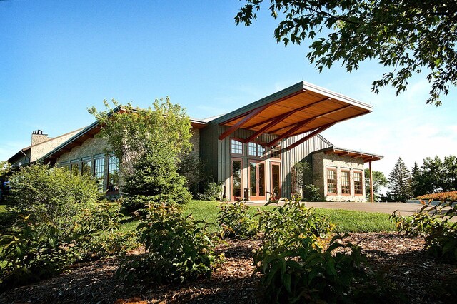 2906 Butternut Dr, Chaska, MN 55318 - rear view of house with french doors and stone siding