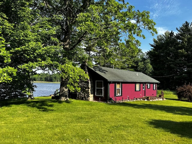 17251 State Highway 6, Deerwood, MN 56444 - view of side of home with a lawn and a water view