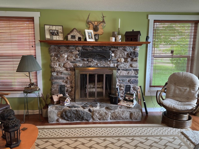 17251 State Highway 6, Deerwood, MN 56444 - living area with a stone fireplace and wood finished floors