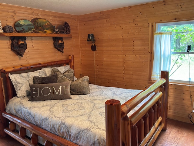 17251 State Highway 6, Deerwood, MN 56444 - bedroom with wood walls and wood finished floors