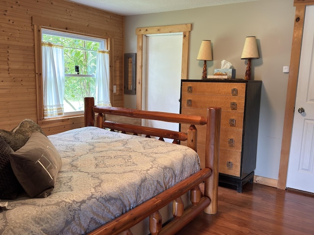 17251 State Highway 6, Deerwood, MN 56444 - bedroom featuring wood finished floors and wood walls