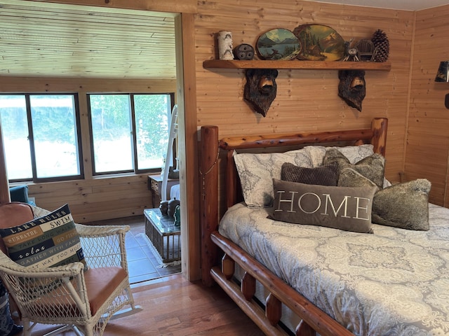 17251 State Highway 6, Deerwood, MN 56444 - bedroom featuring wooden walls and wood finished floors