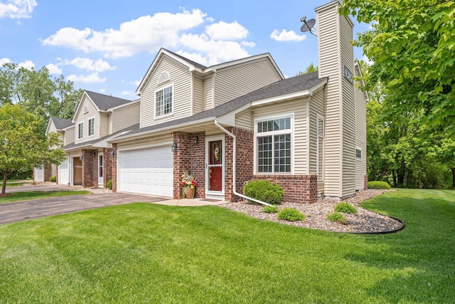 4345 Merrimac Ln N Unit 7, Plymouth, MN 55446 - view of front of home featuring asphalt driveway, brick siding, a chimney, a front lawn, and roof with shingles