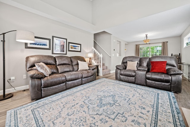 4345 Merrimac Ln N Unit 7, Plymouth, MN 55446 - living room featuring wood finished floors, stairs, and baseboards