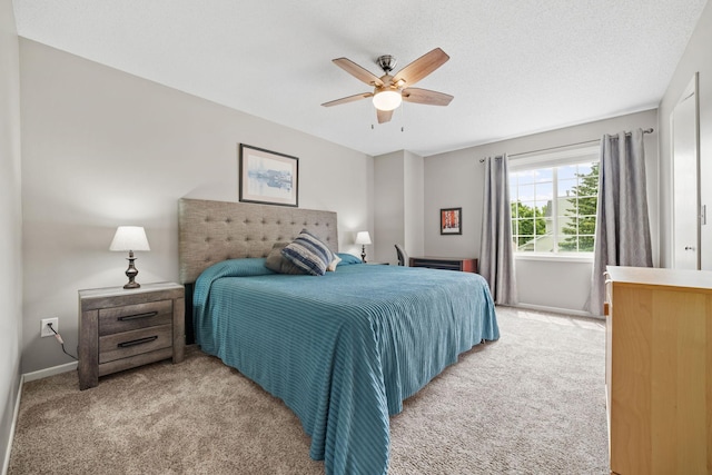 4345 Merrimac Ln N Unit 7, Plymouth, MN 55446 - bedroom featuring light carpet, ceiling fan, and baseboards