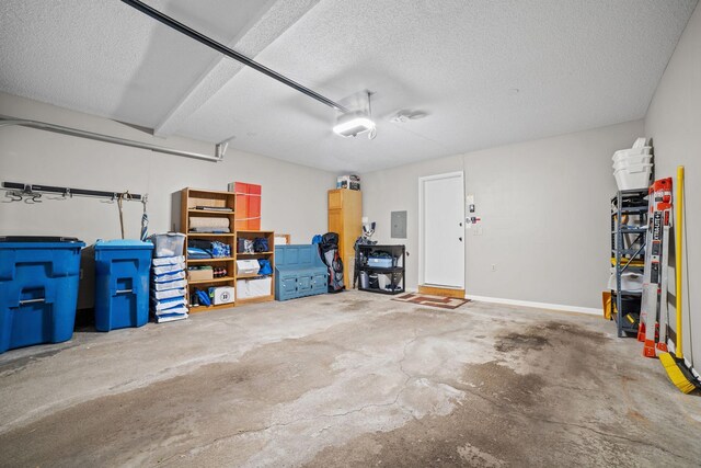 4345 Merrimac Ln N Unit 7, Plymouth, MN 55446 - garage with electric panel and a garage door opener