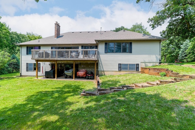 3250 Wild Turkey Ln, Red Wing, MN 55066 - back of house featuring a wooden deck, a chimney, a yard, and a patio area